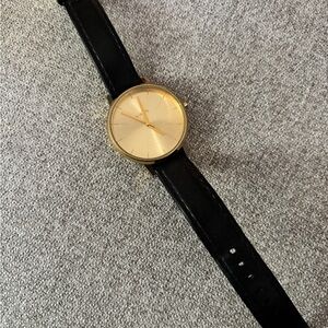 Nixon The Kensington Gold Watch with Black Leather Strap